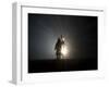 Performer is Silhouetted at the Opening Ceremonies for the XXI Olympic Winter Games in Vancouver-null-Framed Photographic Print