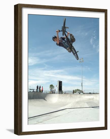 Performing a Bicycle Stunt-null-Framed Premium Photographic Print