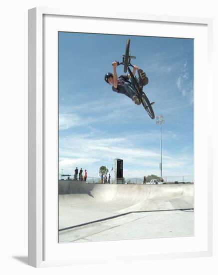 Performing a Bicycle Stunt-null-Framed Premium Photographic Print