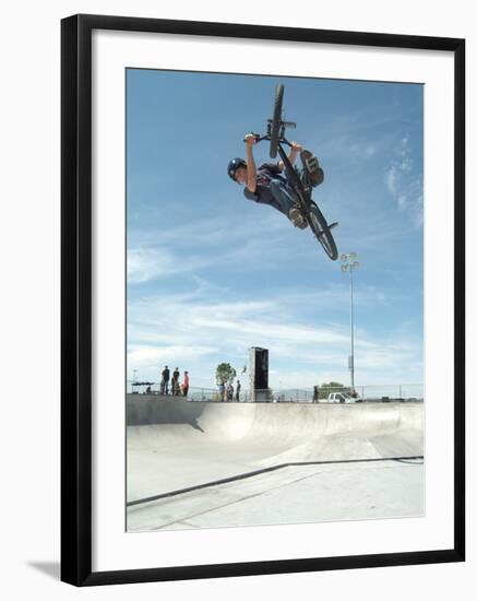 Performing a Bicycle Stunt-null-Framed Premium Photographic Print