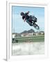 Performing a Bicycle Stunt-null-Framed Photographic Print