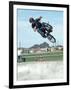 Performing a Bicycle Stunt-null-Framed Photographic Print