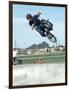 Performing a Bicycle Stunt-null-Framed Photographic Print