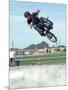 Performing a Bicycle Stunt-null-Mounted Photographic Print