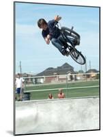 Performing a Bicycle Stunt-null-Mounted Photographic Print