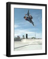 Performing a Bicycle Stunt-null-Framed Photographic Print