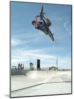 Performing a Bicycle Stunt-null-Mounted Photographic Print