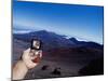 Person Holding Out a Compass-null-Mounted Photographic Print