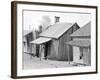 person houses, Mississippi, 1936-Walker Evans-Framed Photographic Print