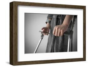 Person on Crutches Texting-Anthony West-Framed Photographic Print