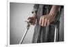 Person on Crutches Texting-Anthony West-Framed Photographic Print