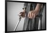 Person on Crutches Texting-Anthony West-Framed Photographic Print