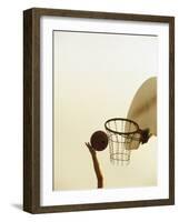 Person's Hand Holding a Basketball Near the Hoop-null-Framed Photographic Print