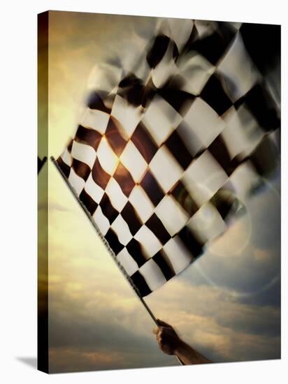 Person's Hand Waving a Checkered Flag-null-Stretched Canvas