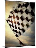 Person's Hand Waving a Checkered Flag-null-Mounted Photographic Print