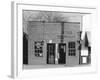 person shop fronts in Vicksburg, Mississippi, 1936-Walker Evans-Framed Photographic Print