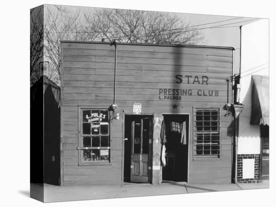 person shop fronts in Vicksburg, Mississippi, 1936-Walker Evans-Stretched Canvas