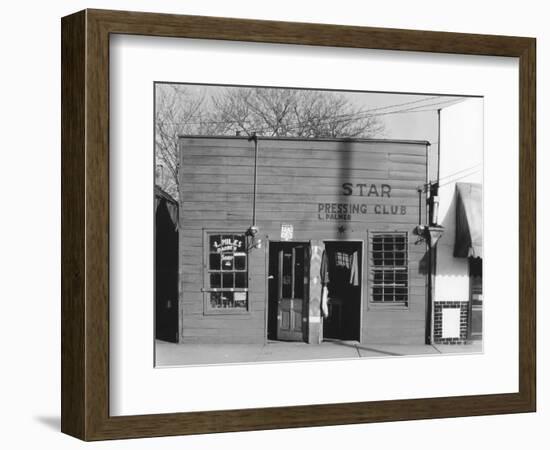 person shop fronts in Vicksburg, Mississippi, 1936-Walker Evans-Framed Photographic Print