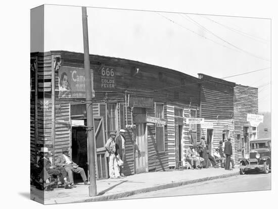 person shop fronts in Vicksburg, Mississippi, 1936-Walker Evans-Stretched Canvas