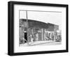 person shop fronts in Vicksburg, Mississippi, 1936-Walker Evans-Framed Photographic Print