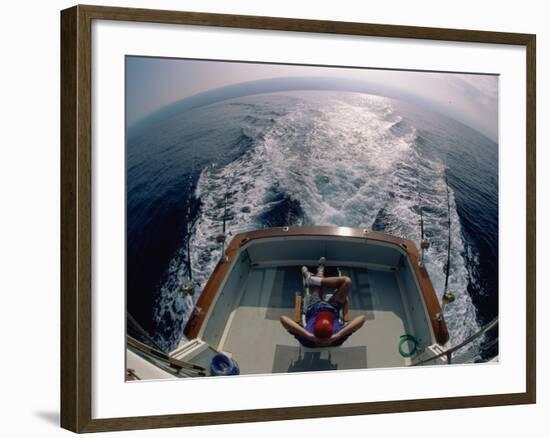 Person Sitting in a Boat-null-Framed Photographic Print