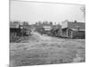 Person Strolling down a Dirt Road-null-Mounted Photographic Print