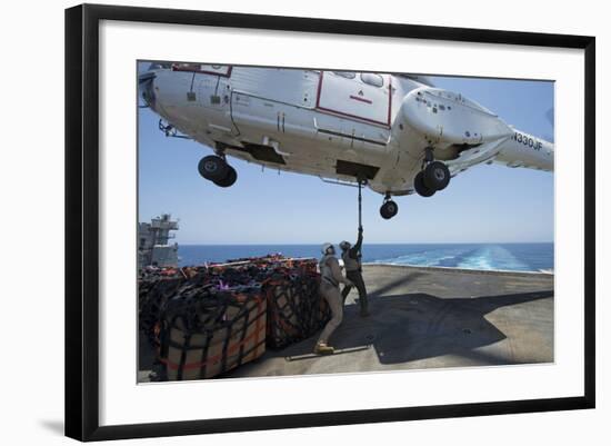 Personnel Attach a Cargo Hook to an SA-330J Puma Helicopter-null-Framed Photographic Print