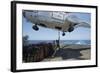 Personnel Attach a Cargo Hook to an SA-330J Puma Helicopter-null-Framed Photographic Print