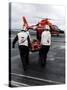 Personnel Carry An Injured Sailor To a Coast Guard MH-65 Dolphin Helicopter-Stocktrek Images-Stretched Canvas