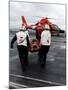 Personnel Carry An Injured Sailor To a Coast Guard MH-65 Dolphin Helicopter-Stocktrek Images-Mounted Photographic Print