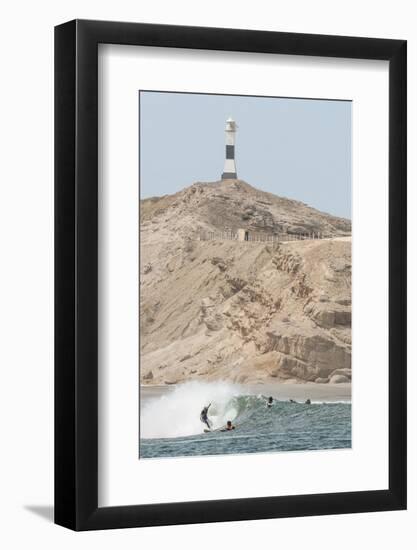 Peru, Cabo Blanco. Surfing near Cabo Blanco, Peru.-Michael DeFreitas-Framed Photographic Print