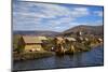 Peru, Uros Islands. The floating reed islands of Lake Titicaca.-Kymri Wilt-Mounted Photographic Print