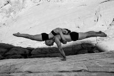 Female gymnast in desert, Overton, Nevada, USA-Pete Saloutos-Photographic Print