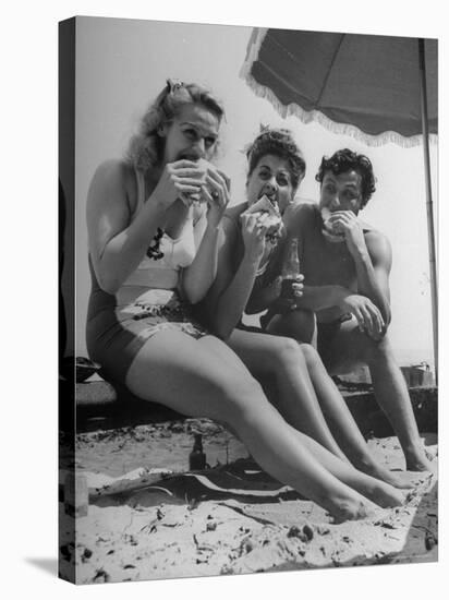 Peter Coe with Martha O'Driscoll Eating Abalone Sandwiches-John Florea-Stretched Canvas
