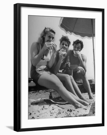 Peter Coe with Martha O'Driscoll Eating Abalone Sandwiches-John Florea-Framed Photographic Print