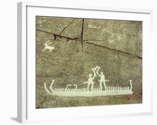 Petroglyph depicting phallic figures on board a ship, apparently performing a ceremonial axe dance-Werner Forman-Framed Giclee Print