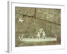 Petroglyph depicting phallic figures on board a ship, apparently performing a ceremonial axe dance-Werner Forman-Framed Giclee Print