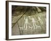 Petroglyph with three men brandishing axes, accompanied by dogs-Werner Forman-Framed Giclee Print