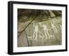 Petroglyph with three men brandishing axes, accompanied by dogs-Werner Forman-Framed Giclee Print