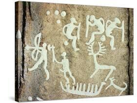 Petroglyphs; figures brandishing weapons, with a reindeer-Werner Forman-Stretched Canvas
