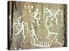 Petroglyphs; figures brandishing weapons, with a reindeer-Werner Forman-Stretched Canvas