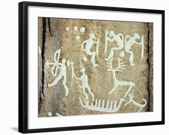 Petroglyphs; figures brandishing weapons, with a reindeer-Werner Forman-Framed Giclee Print