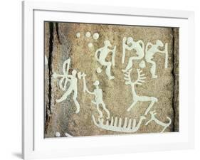 Petroglyphs; figures brandishing weapons, with a reindeer-Werner Forman-Framed Giclee Print