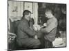 'Petty Officer Evans Binding Up Dr. Atkinson's Hand', 5 July 1911, (1913)-Herbert Ponting-Mounted Photographic Print