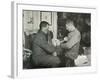 'Petty Officer Evans Binding Up Dr. Atkinson's Hand', 5 July 1911, (1913)-Herbert Ponting-Framed Photographic Print