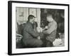 'Petty Officer Evans Binding Up Dr. Atkinson's Hand', 5 July 1911, (1913)-Herbert Ponting-Framed Photographic Print