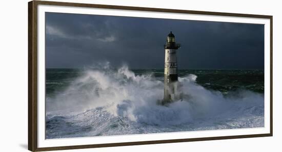 Phare d'Ar-Men lors d'une tempete-Jean Guichard-Framed Art Print