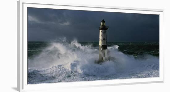 Phare d'Ar-Men lors d'une tempete-Jean Guichard-Framed Art Print