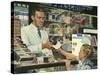 Pharmacist at Counter, 1946-null-Stretched Canvas