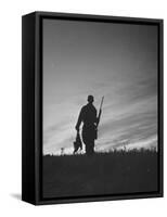 Pheasant Hunter Carrying Bird That He Killed-Wallace Kirkland-Framed Stretched Canvas